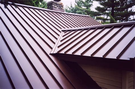 house with metal roof beams|metal standing seam roofing.